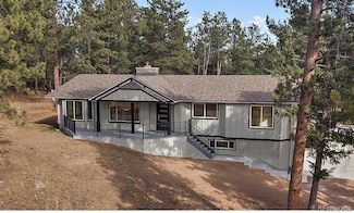 8836 Surrey Dr, Evergreen, CO 80439