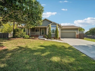 516 E Oakwood Dr, Rose Hill, KS 67133