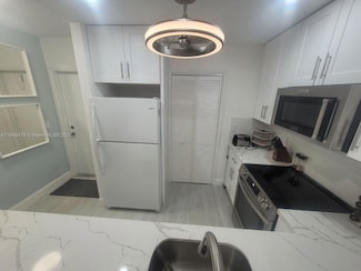 300 Golden Isles Dr Unit 217, Hallandale Beach, FL 33009