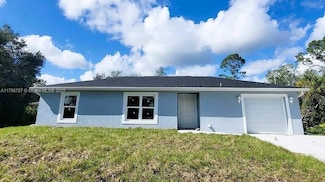 6028 Kumquat Cir, La Belle, FL 33935
