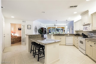 8565 Via Garibaldi Cir Unit 104, Estero, FL 33928