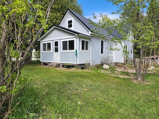 127 S Meridian St, Cedarville, MI 49719