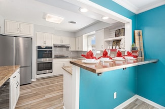 7730 Chantilly Cir, Galveston, TX 77551