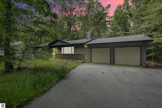 10085 Harmony Dr, Interlochen, MI 49643