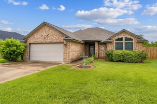 1040 Cardinal Dr, Richwood, TX 77566
