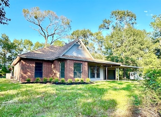 6059 Woodland Lakes Loop, Willis, TX 77378