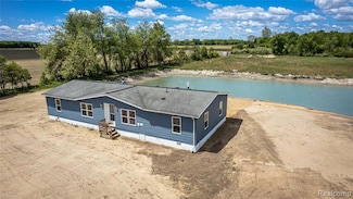 5730 Cavendar Dr, Shepherd, MI 48883