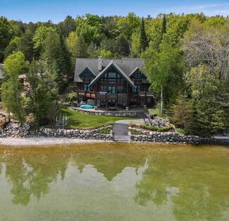 7765 Cedar Ln, East Jordan, MI 49727