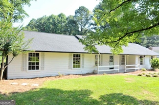 5974 Four Winds Dr SW, Lilburn, GA 30047