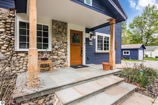 10190 SE Torch Lake Dr, Alden, MI 49612