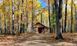 275 E Skyline Dr, Roscommon Vlg, MI 48027