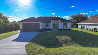 703 Otto Ave N, Lehigh Acres, FL 33971