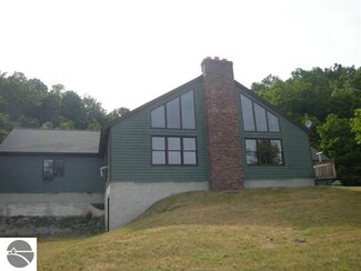 6064 Valley Rd, Honor, MI 49640