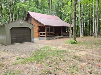 8745 Whispering Pines Dr, Mancelona, MI 49659