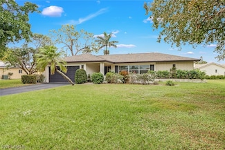 355 Valley Stream Cir, Naples, FL 34113