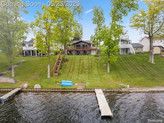 13953 Grandpoint Dr, Cement City, MI 49233