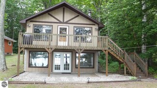8028 Ash Ave, Honor, MI 49640