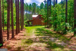 1114 N Riddle Rd, Sandersville, GA 31082
