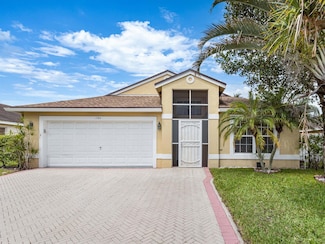 1784 Sawgrass Cir, Greenacres, FL 33413