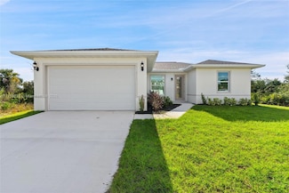 957 Commodore St, Lehigh Acres, FL 33974
