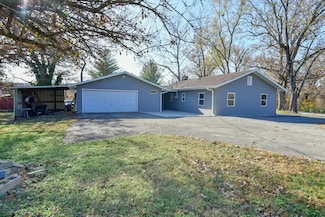 413 Molly Ln, Rockaway Beach, MO 65740