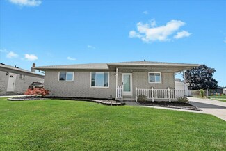 16300 Woodstock Dr, Macomb, MI 48044