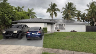 323 Canterbury Dr W, Riviera Beach, FL 33407