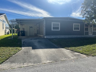 6164 N Joshua Ln, Atlantis, FL 33462