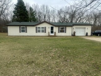 5721 Beecher Rd, Osseo, MI 49266
