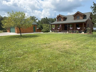 103 Arbutus Dr, Cadillac, MI 49601