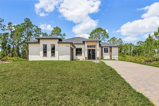 956 Columbus Blvd, Lehigh Acres, FL 33974