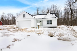 5733 Chokeberry Ln, Grawn, MI 49637