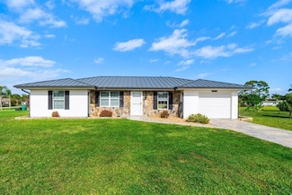 1697 SE Lyngate Dr, Port Saint Lucie, FL 34952