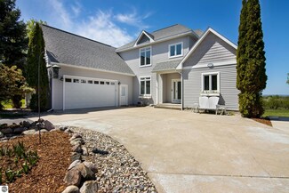7204 Mcdermott Dr, Kewadin, MI 49648