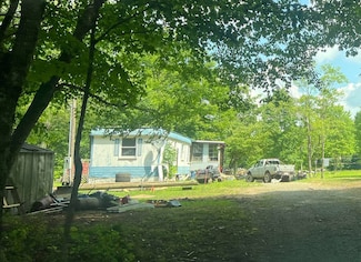 561 County Route 415, CharMcO, WV 25801
