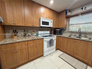 9741 Sunrise Lakes Blvd Unit 107, Sunrise, FL 33322