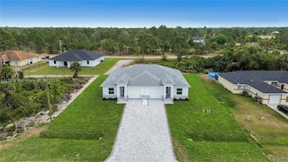 1153 Countess Ave, Lehigh Acres, FL 33974