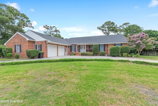 9 Quail Hollow Dr, Oak Island, NC 28465