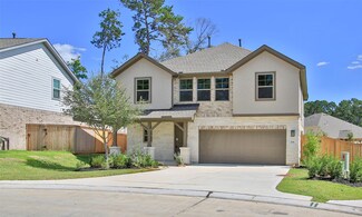 214 Woods Rose Ct, Willis, TX 77318