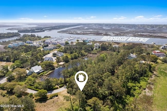 1 Barnes Bluff Dr SE, Oak Island, NC 28461