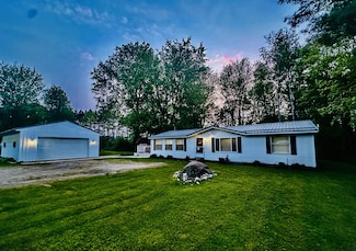 7976 Ojibwa Dr, Weidman, MI 48893