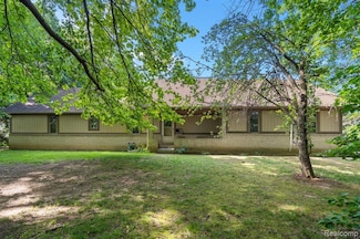 1500 Rustic Ln, Wolverine Lake, MI 48390