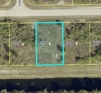 1008 Kanuga St E, Lehigh Acres, FL 33974