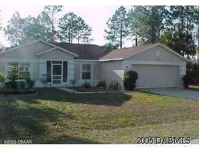 32 Rainbow Ln, Palm Coast, FL 32164