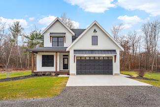 10048 Barberry Ln, Howard City, MI 49329