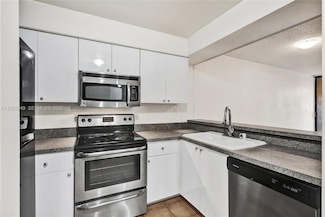 15555 Miami Lakeway N Unit 207, Miami Lakes, FL 33014