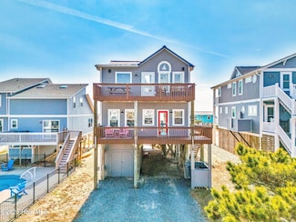 318 E Beach Dr, Oak Island, NC 28465