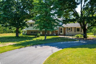 1299 Fernwood Dr, Grawn, MI 49637