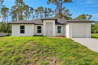 708 Lamar St E, Lehigh Acres, FL 33974