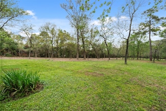 10048 Pine Springs Dr, Conroe, TX 77304